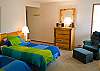 This Twin Master Bedroom is light bright and airy.
