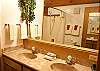 Master Bathroom with two sinks and a tub/shower combination.