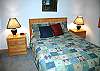 Queen bedroom offers room for extra famly  members or another couple.