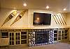New "Bonus Room" with large 55" flat screen TV and cozy fireplace. Great place for the kids or the whole family. Relax by the fireplace, watch a movie or read a book.