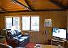 Great cabin feel, wooden beams and natural light make this home feel inviting and comfortable.