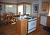 Be part of the conversation while fixing your meals.  Plenty of room for all to help in the kitchen.