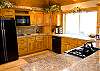 Spacious kitchen is outfitted with all the necessities to create a feast to remember.