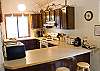 The kitchen is fully equipped and ready for your stay.