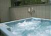 Totally enclosed hot tub ready for your enjoyment.