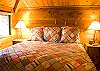 Very cozy rustic Master King Suite, located on the 1st floor of this great cabin. Lay and watch a movie on your private tv after a long fun day.