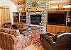Another view of the Flat Screen TV and Fireplace.