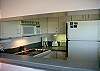 Kitchen has open view. Clean and efficient this kitchen has everything you need to get the job done.