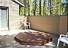 Relax in the bubbling waters of your own private hot tub.