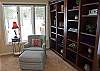 Enjoy a good book in this cozy corner of the great room.