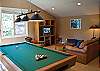 Upstairs rec. room has a pool table, TV, board games, ect. This truly is a dream home for a vacation.