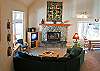 Imagine the great times to be had in this warmly decorated room.