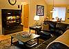 Spacious living room with gas burning fireplace.