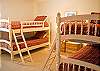 Lots of space in this double bunk bed room.