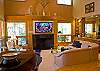 The living room is everyone's dream, flat screen tv, piano and wet bar.