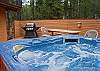 Enjoy a nice soak in the bubbling hot tub after a day of hiking or skiing.