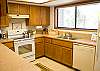 This home has a fully equipped kitchen with lots of natural light.