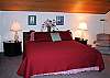 King bedroom suite loft with walk-in closet, TV, VHS/DVD, large bath with Jacuzzi tub with sky light over tub area, shower, double sinks.