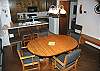 Great space for a game of cards or a meal. Seats 6 with 3 additional seats at the breakfast bar.