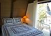 Upstairs bedroom has it's own private deck.