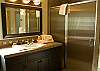 Full bath and shower in hallway.