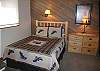 Full Size Bed and 2 Sets of Bunks are in loft. Great space for kids.