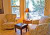A small nook in the kitchen is a great place to enjoy your morning coffee or a glass of wine in the evening sun.