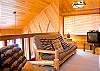 Loft area with television and futon