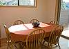 Dining table looking out at upper deck.