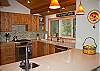 The newly remodeled kitchen is perfect for whipping up a family meal!