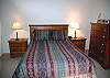 Upstairs Queen Bedroom share connecting bath with Bunk bedroom.  This bedroom has a TV and stereo.