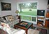 The living room with great window
view out on to the golf course.