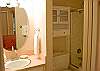 Master Bath also serves as downstairs bathroom with hallway access as well as master access.
