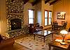 Escape from the winter weather to this cozy living room.  This room features a gas fireplace and comfortable furnishings for everyone to kick back and relax!