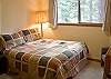 Queen Bedroom Downstairs that shares the hall bathroom.