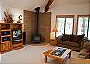 This home is set up for entertaining!  The den is complete with a wet bar,stereo, TV and a DVD player.  There is a door off the den that leads to the deck.