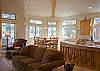 Wonderful light spills in through the multiple windows. Light earthtones sets the tone for a tranquil visit.