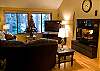Living Room with Flat Screen TV and Gas Fireplace.