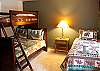 A King Bed and Twin with a Pyramid Bunk Bed.