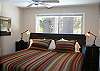 The King Master Bedroom is off the living room.