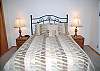 Very comfortable Queen Bedroom with TV. This Bedroom shares the bathroom with the Twin Bedroom.