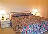 The King Master Bedroom has a sliding door which opens onto deck with great views of Lake Aspen and Mt. Bachelor.