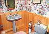 A half bath is located upstairs next to the great room.