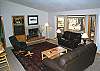 Enjoy sitting around and catching up on the day's activities in this beautifully furnished living room.