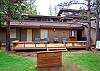 Back yard deck with horse shoe pit.