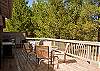 Great gathering for family and friends on this very spacious deck with fabulous views of the splendid Pine Trees, and the ocean blue sky.
