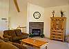 Light and bright featuring a gas fireplace.
