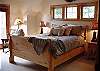 Queen Master Bedroom Upstairs.  Home also has two more Queen Bedrooms upstairs.