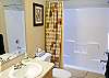 Hall bathroom with a tub/shower. The queen and twin bedrooms  share this bathroom.