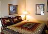 Upstairs loft bedroom features a king size bed.  Loft inlcludes a bathroom with a shower.